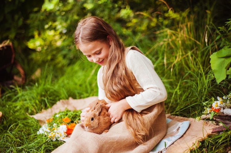girl and rabbit