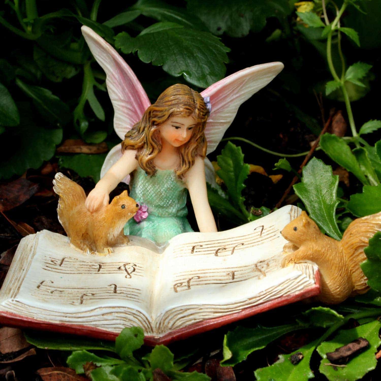 Fairy and squirrels reading